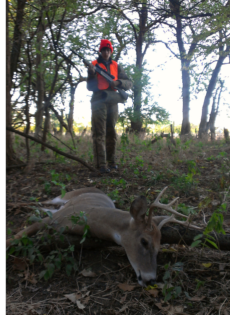 Kyle Stefanich stalks up on his very first deer during Illinois youth firearm season October of 2012. He made a perfect double lung shot which made for a pretty easy tracking job.